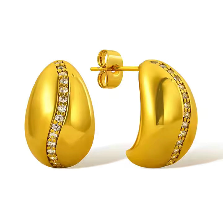 18k gold plated curved stud earrings with a diagonal line of crystals across smooth polished surface