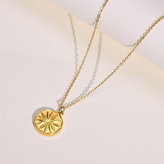 18k gold plated necklace with delicate chain and circular sunburst medallion pendant