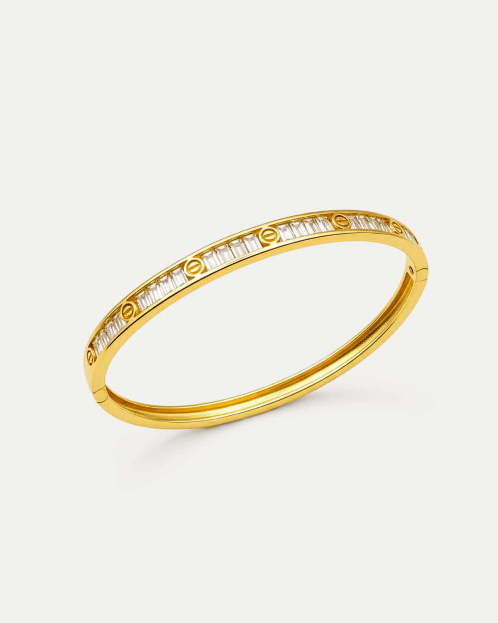 Artemis Crystal Bangle – 18K gold-plated brass bracelet with baguette and round crystal detailing, elegant slim bangle design