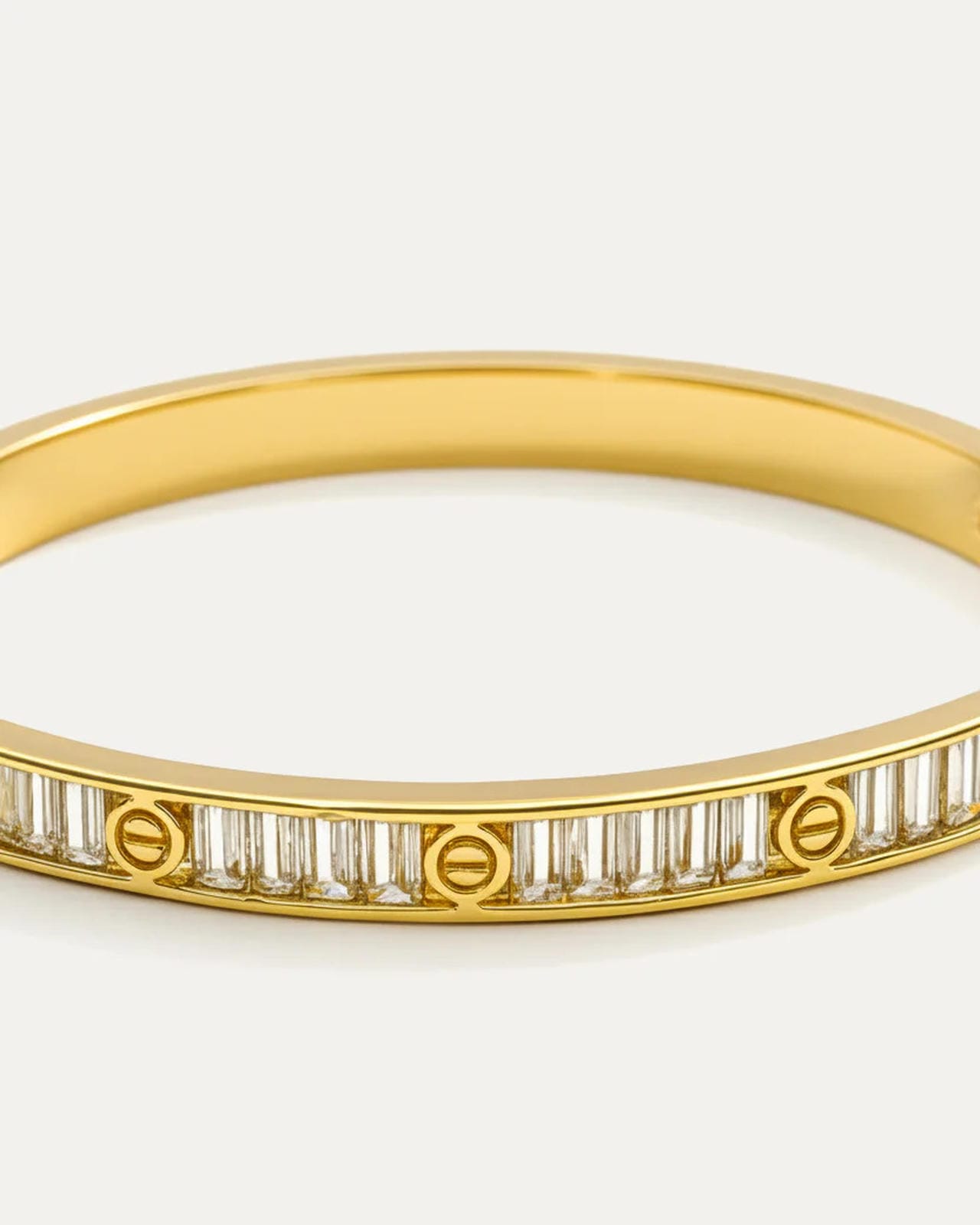 Artemis Crystal Bangle – 18K gold-plated brass bracelet with baguette and round crystal detailing, elegant slim bangle design