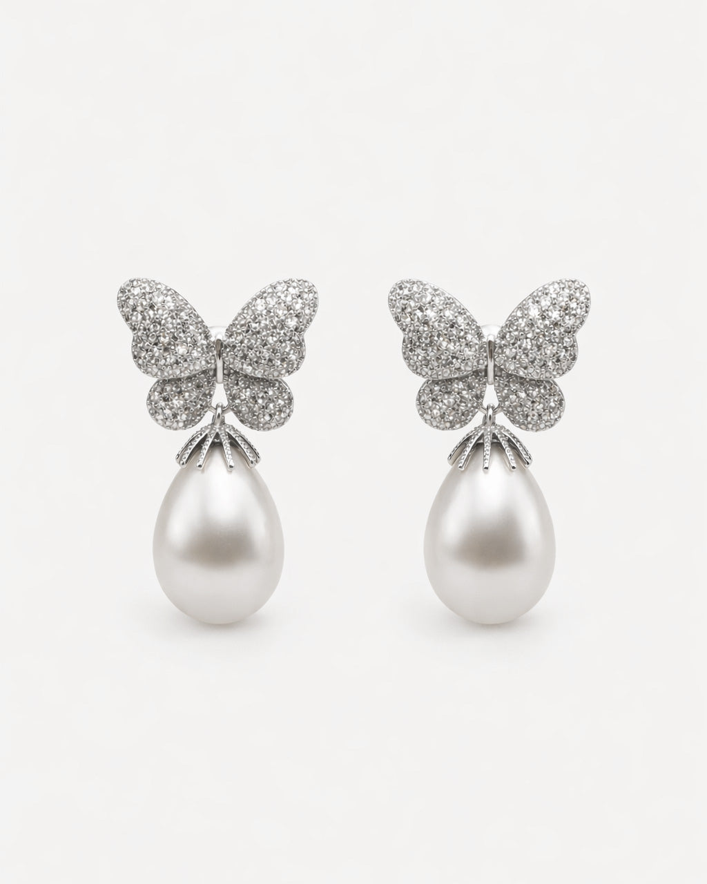 Butterfly pearl drop earrings silver plated with cubic zirconia front view pair