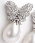 Butterfly pearl drop earrings silver plated cubic zirconia macro pearl detail view