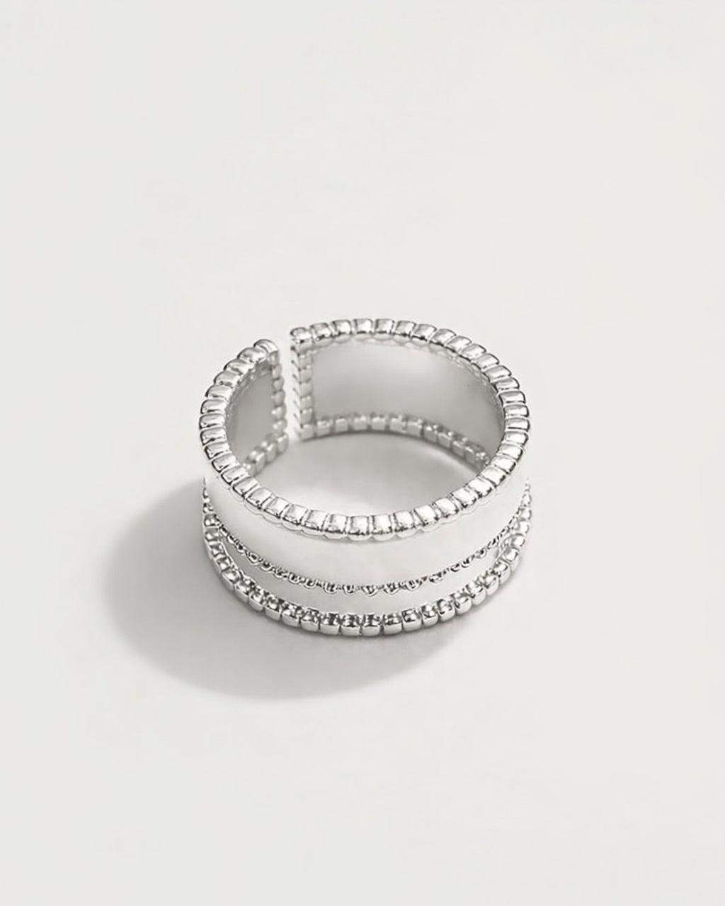 Silver-plated adjustable band ring with layered texture, minimalist stackable jewelry style