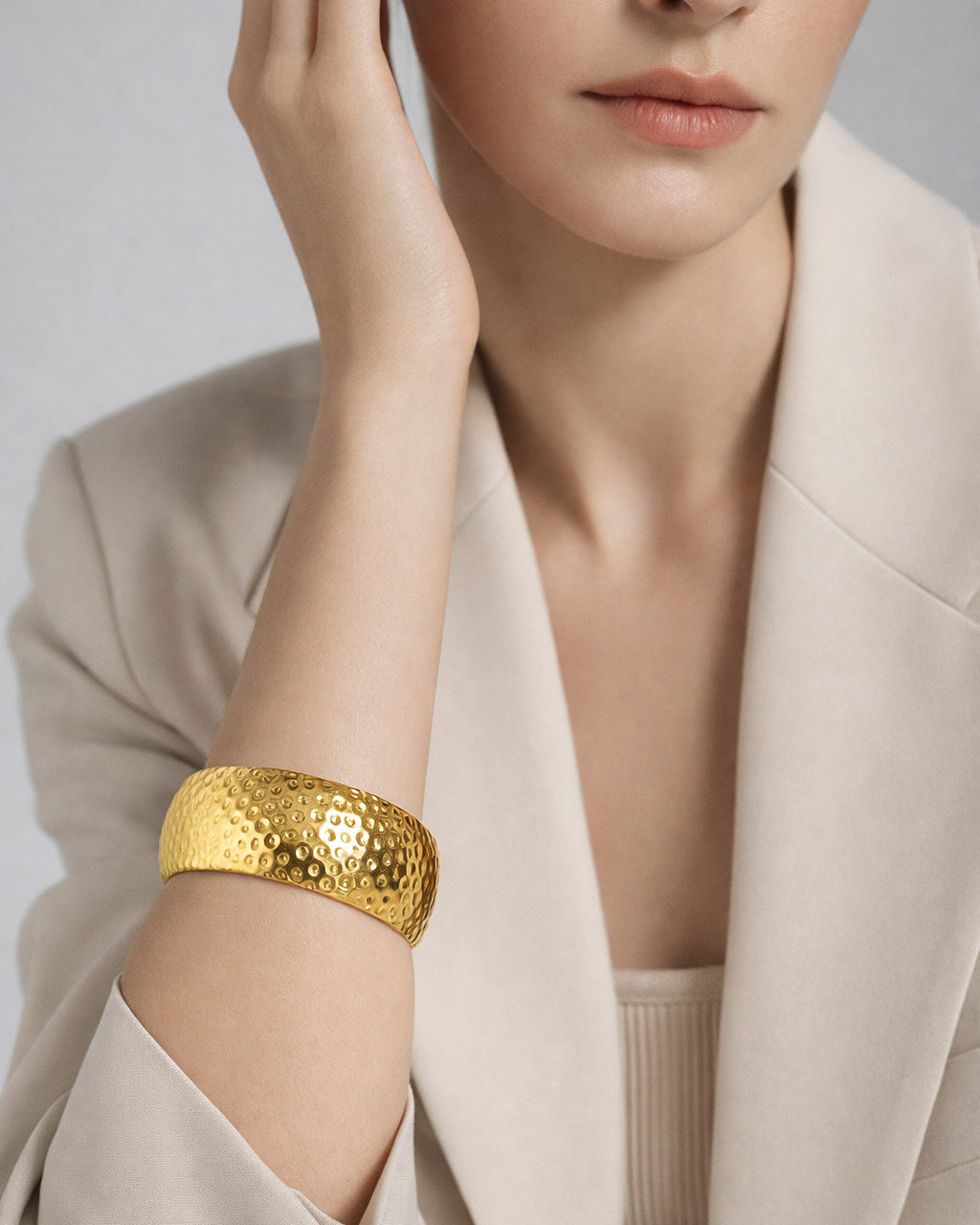 Hammered gold cuff bracelet on model, 18K gold-plated minimalist jewelry