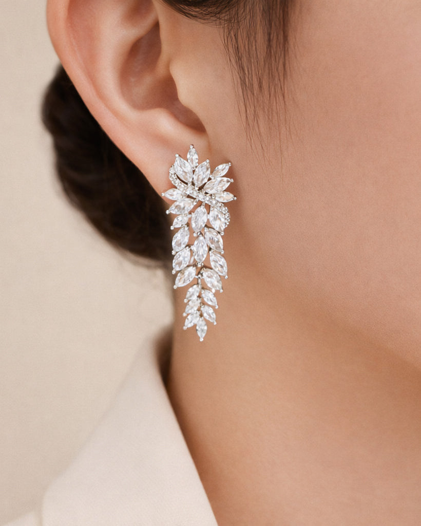 Marquise zirconia leaf drop earrings on ear, rhodium-plated brass
