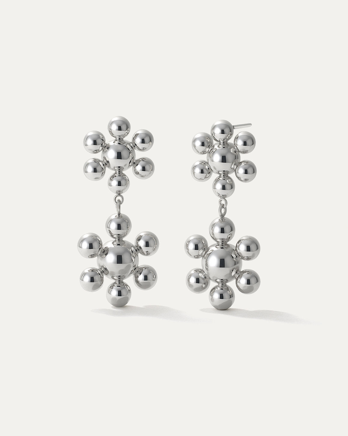 Silver floral drop earrings with double blossom cluster made of polished spheres, sculptural statement style by Jadejuri