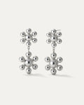Silver floral drop earrings with double blossom cluster made of polished spheres, sculptural statement style by Jadejuri