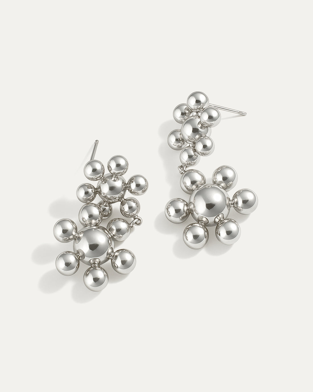 Silver floral drop earrings with double blossom cluster made of polished spheres, sculptural statement style by Jadejuri