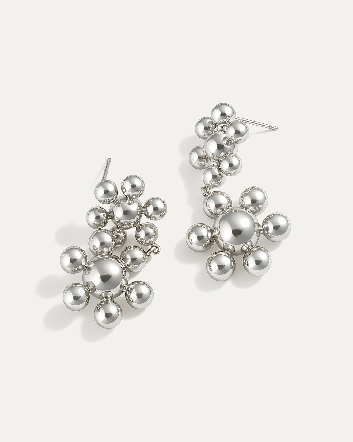 Silver floral drop earrings with double blossom cluster made of polished spheres, sculptural statement style by Jadejuri