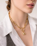 18K gold-plated lock pendant necklace worn on model, bold chain necklace for women, modern statement jewelry