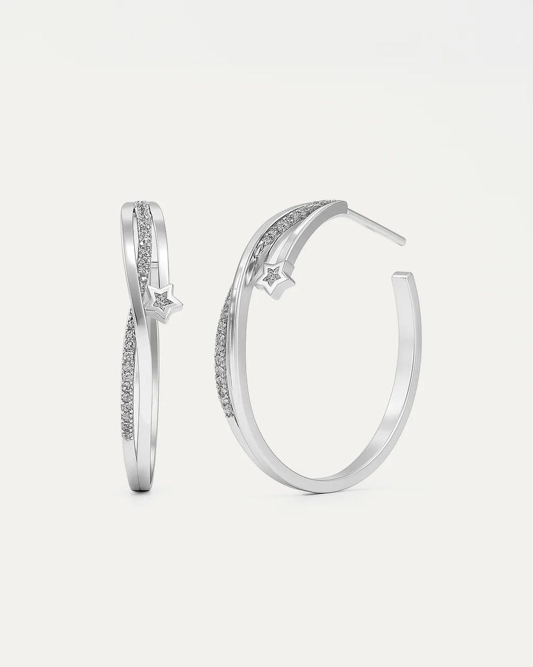 Pair of silver hoop earrings with small diamonds on a light gray background