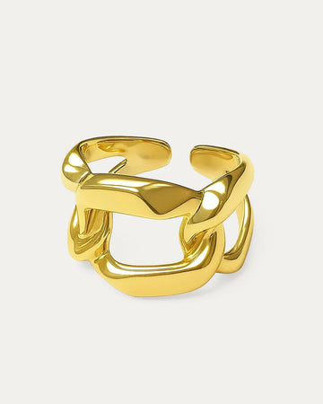 A close-up studio shot of a chunky, adjustable gold-tone ring on a plain white background. The ring's design features a bold,