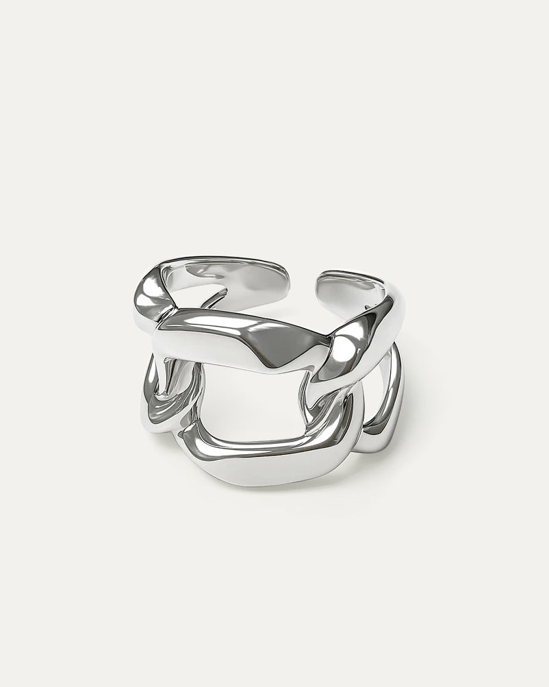 Silver ring with a modern design on a white background