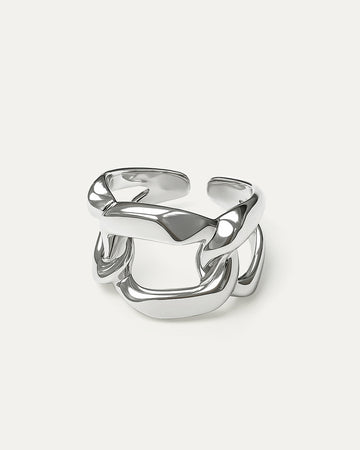 Silver ring with a modern design on a white background