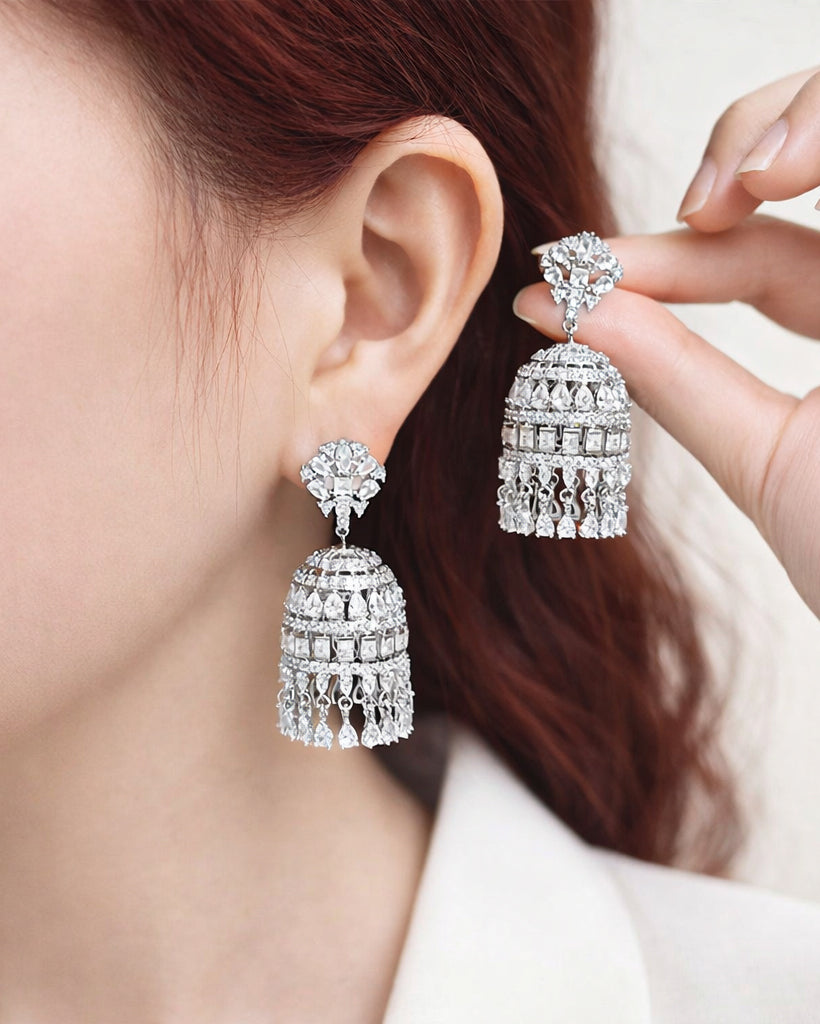 Crystal bell tassel earrings with cubic zirconia in a long drop statement design