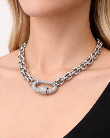Silver-plated crystal shackle chain necklace worn by model, modern women's jewelry