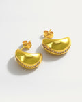 18k gold plated curved stud earrings with a diagonal line of crystals across smooth polished surface