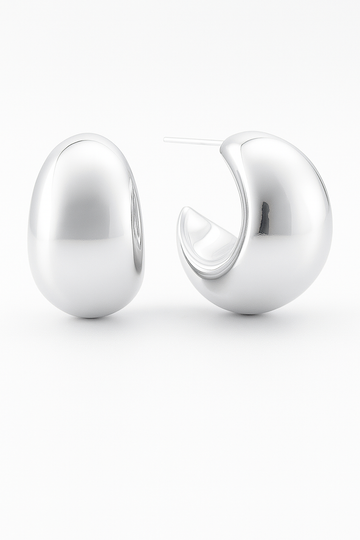 Pair of silver hoop earrings on a white background