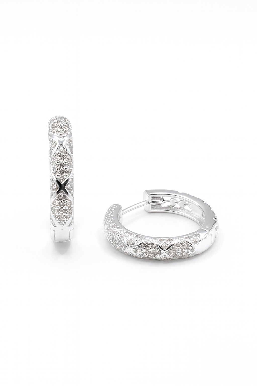 Silver hoop earrings with embedded stones on a white background