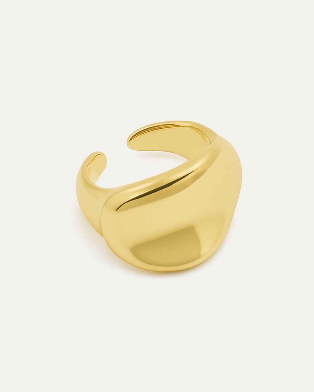 Gold open statement ring with a smooth domed curve and minimal design