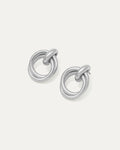 Shop Double Round Studs – interlocked silver-plated earrings with a minimalist sculptural look. Lightweight and versatile for everyday wear.