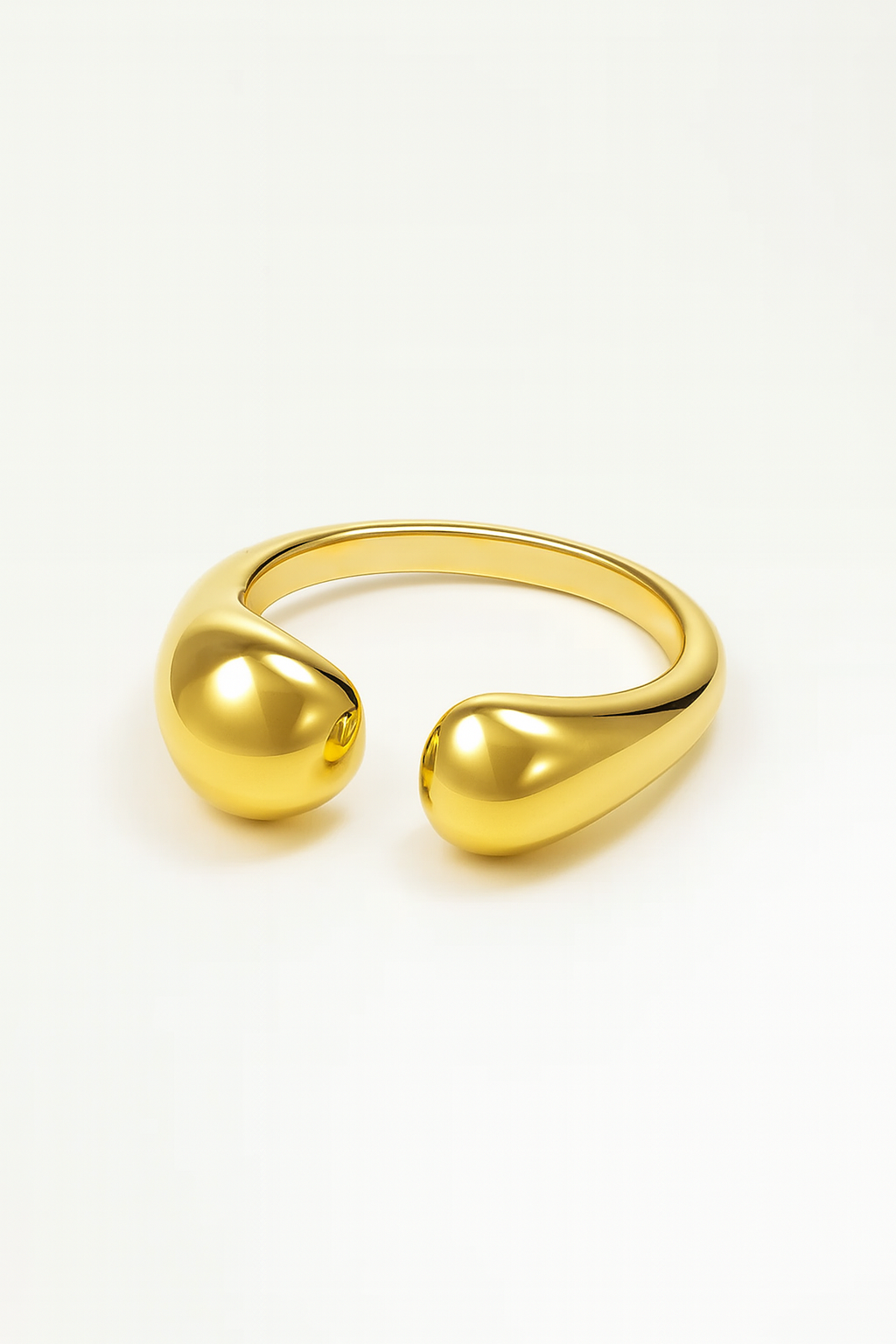 Duo Drop Ring in 18K gold-plated brass with dual polished drop-inspired open design.