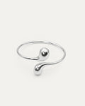 Eclipse Drop Cuff in silver-plated brass with double droplet ends and a polished sculptural finish