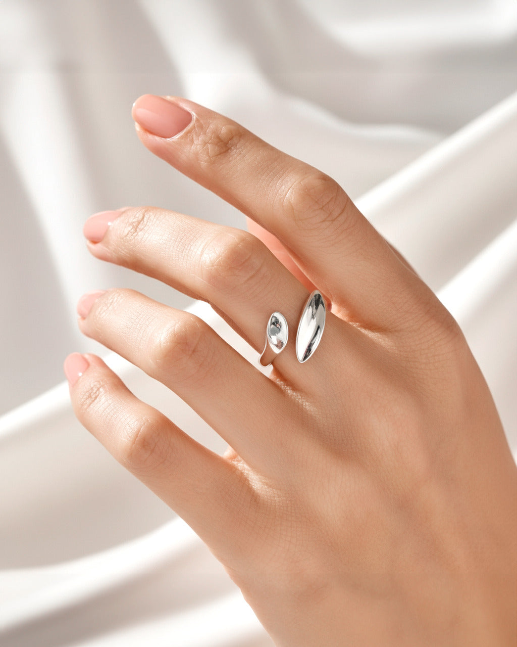 Eclipse Wave Ring in polished silverplated brass, sculptural wave-inspired design