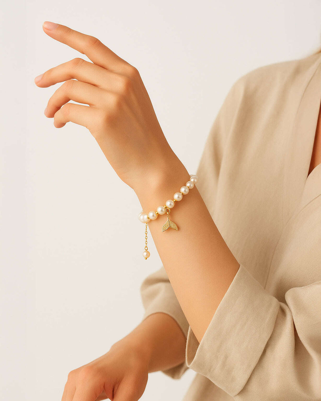 18K gold-plated pearl bracelet with crystal fish tail charm and adjustable drop chain, minimalist jewelry by Jadejuri