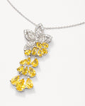 Yellow zirconia floral cascade pendant, rhodium-plated necklace