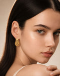 18K gold plated teardrop earrings worn by model, elegant women's jewelry style