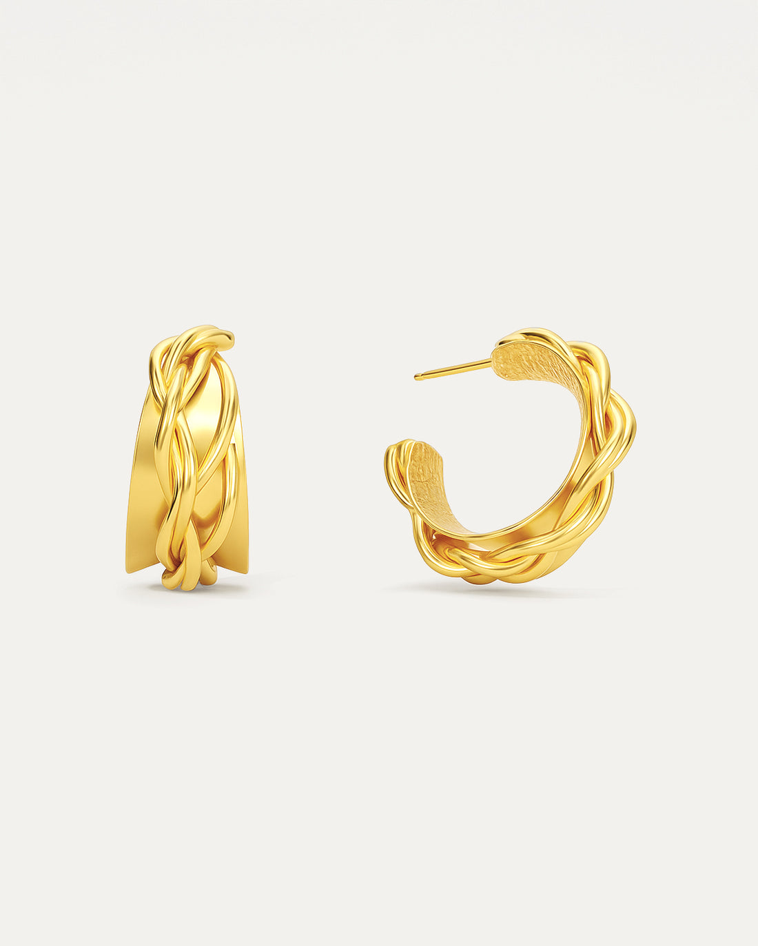 Pair of gold hoop earrings on a light gray background
