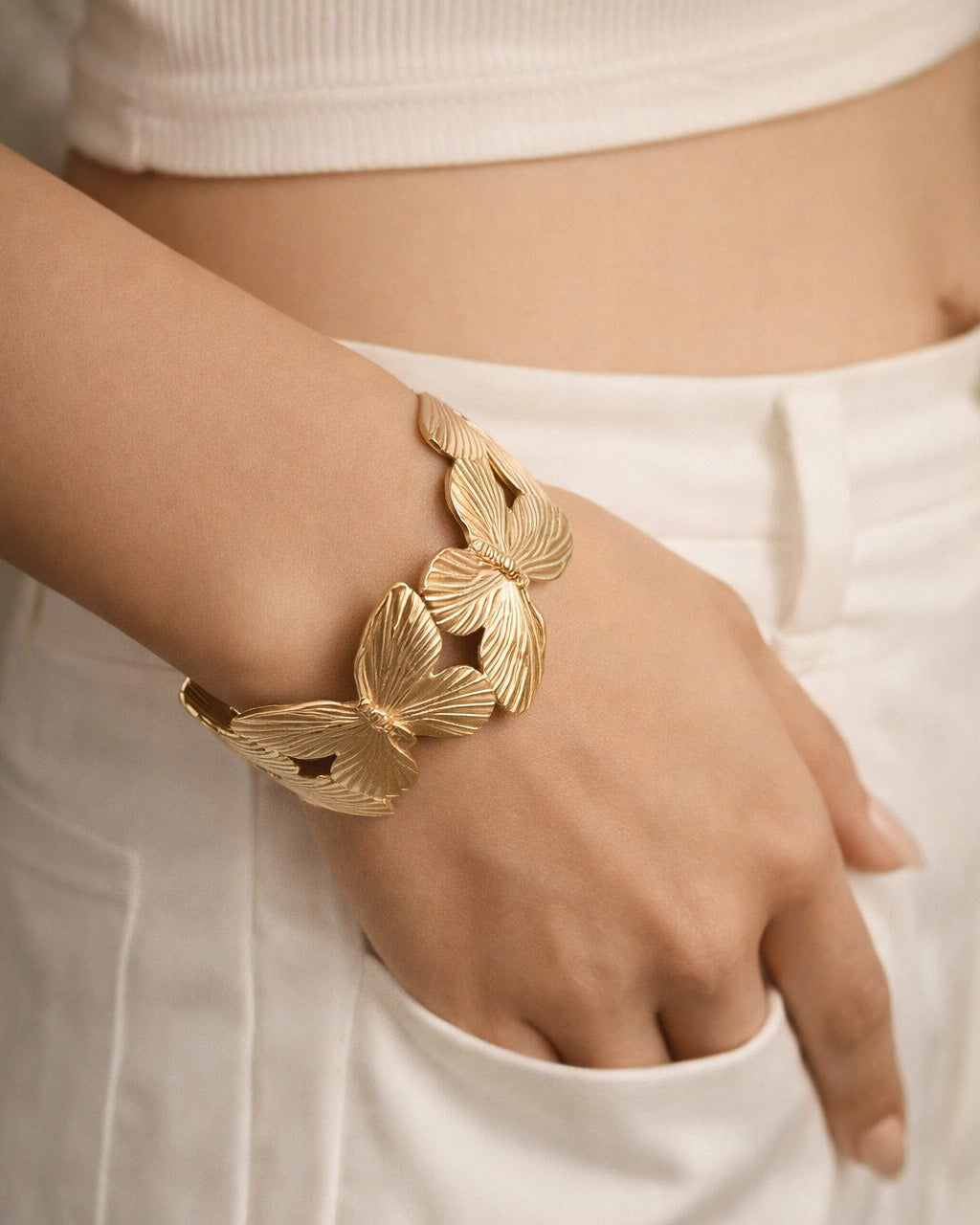 18k gold plated butterfly cuff bracelet worn on wrist, elegant minimalist women jewelry