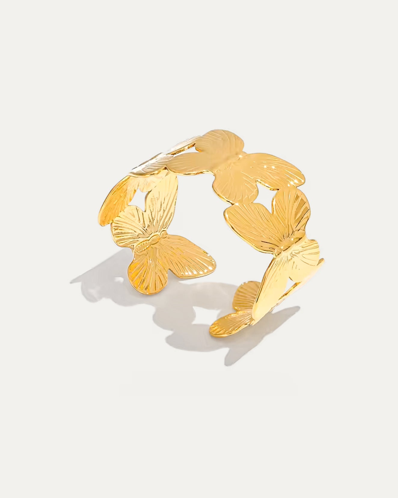 Golden Butterfly Cuff Bracelet with engraved wings in gold finish – Jadejuri