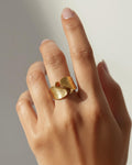 18K gold-plated petal ring worn on hand, elegant minimalist statement jewelry