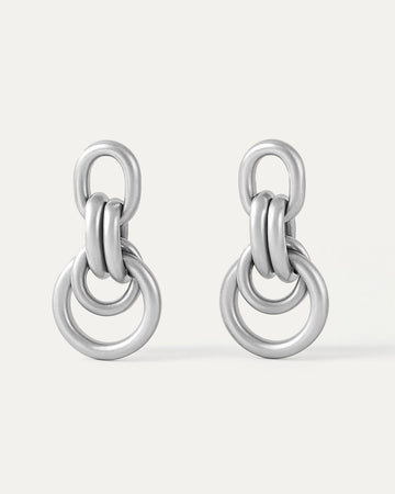 Pair of silver chain-link earrings on a white background