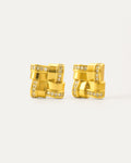 18K gold-plated interlocked square crystal stud earrings on minimalist background