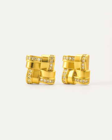 18K gold-plated interlocked square crystal stud earrings on minimalist background