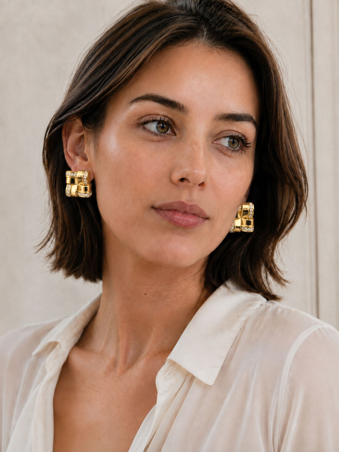 Interlocked square crystal stud earrings in 18K gold-plated elegant look style
