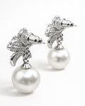 Pearl drop earrings back view with cubic zirconia floral detail silver tone