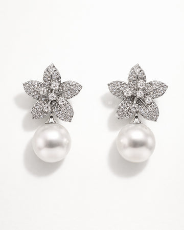 Ivory Bloom pearl drop earrings with cubic zirconia floral design front view