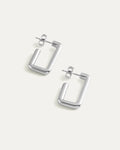 Pair of silver hoop earrings on a white background