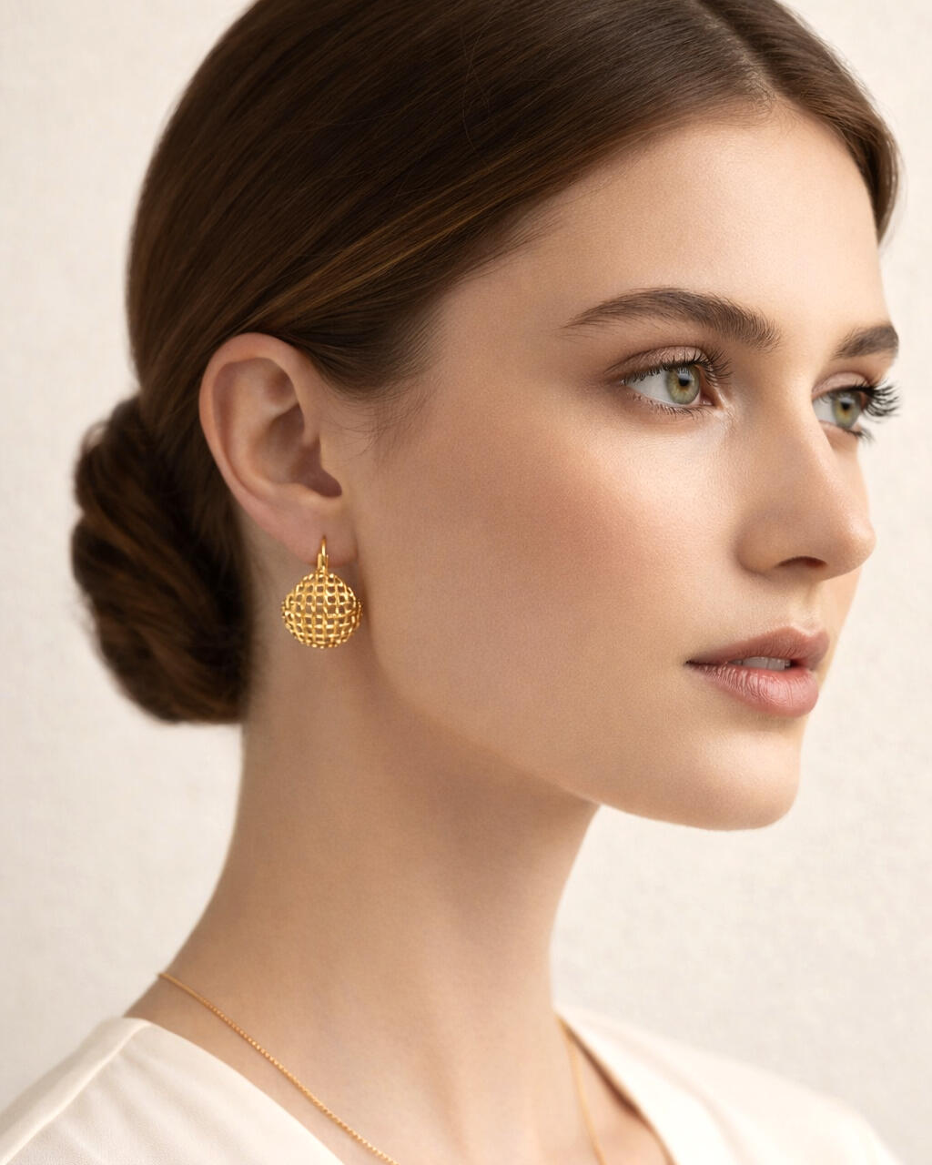Model wearing 18K gold-plated lattice basket hoop earrings, textured gold hoop earrings for women, minimalist luxury jewelry style
