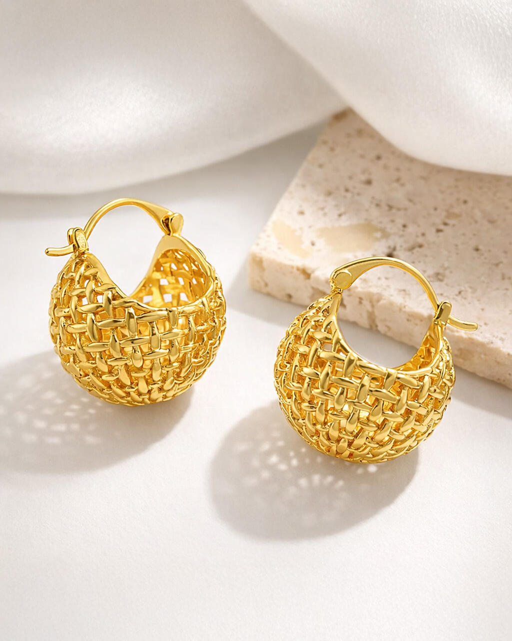 18K gold-plated lattice basket hoop earrings with woven texture, gold statement hoop earrings on neutral background