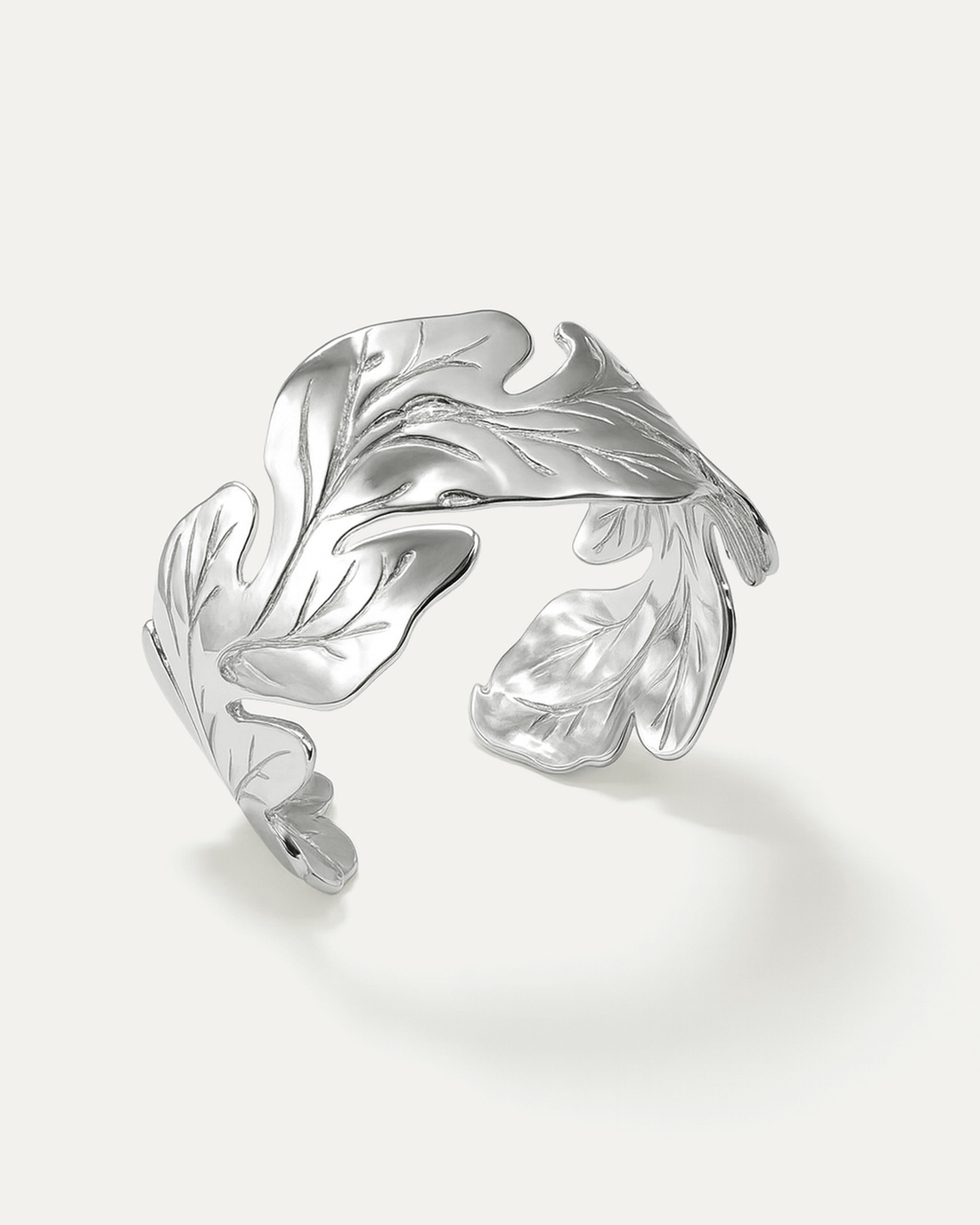 Leaf Harmony Cuff – Silver-plated brass cuff bracelet with sculptural leaf design, nature-inspired jewelry.