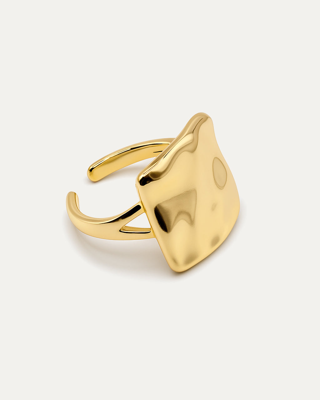 Bold gold statement ring with molten square sculptural face