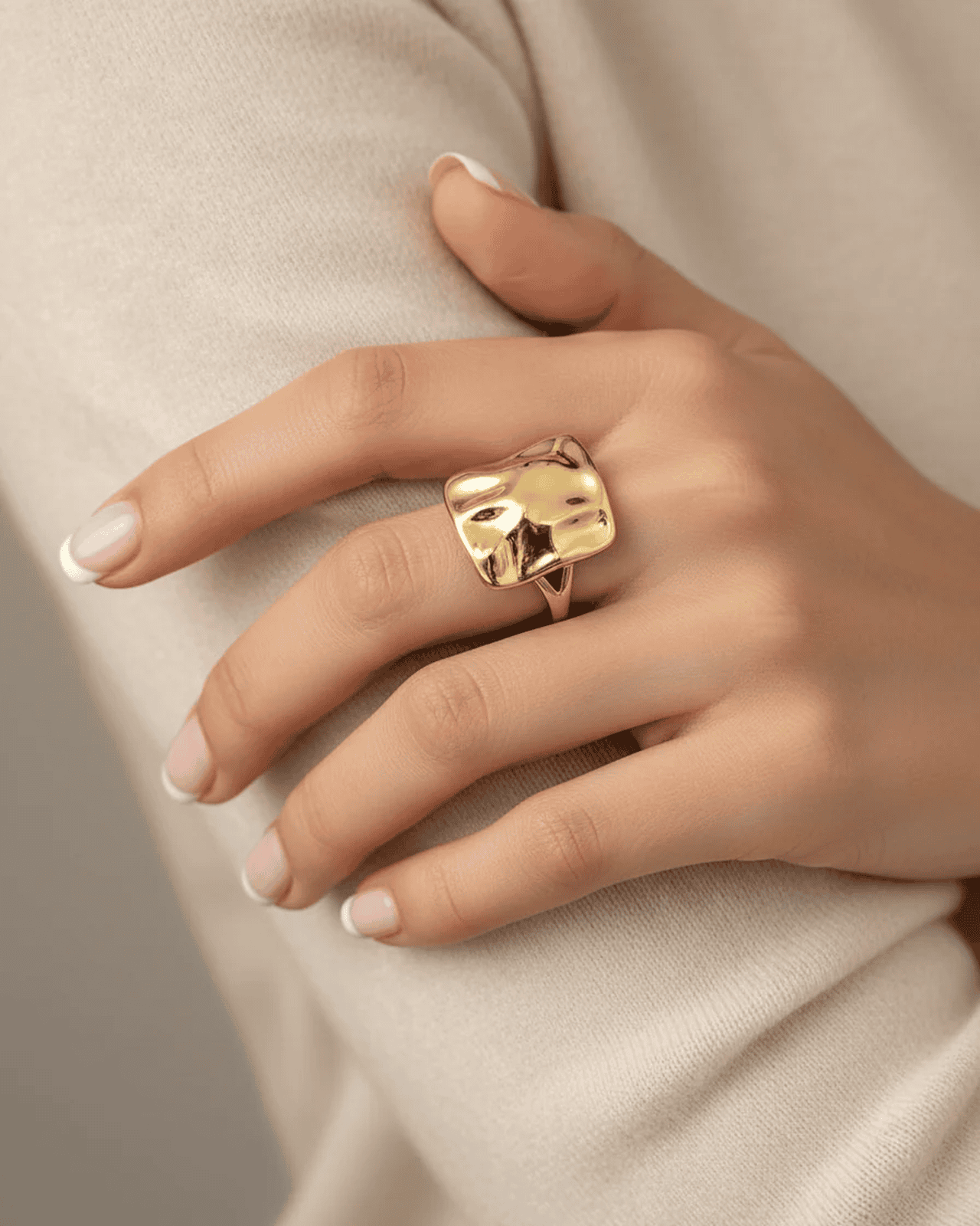 Bold gold statement ring with molten square sculptural face