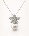 Pearl drop flower pendant necklace with zircon stones, gold plated elegant front view