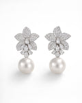 Lumière Bloom pearl drop earrings with cubic zirconia flower bridal design