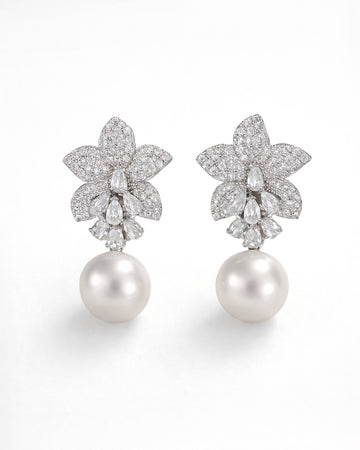 Lumière Bloom pearl drop earrings with cubic zirconia flower bridal design
